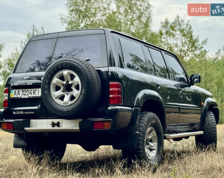 Черный Ниссан Патрол, объемом двигателя 3 л и пробегом 390 тыс. км за 11750 $, фото 8 на Automoto.ua
