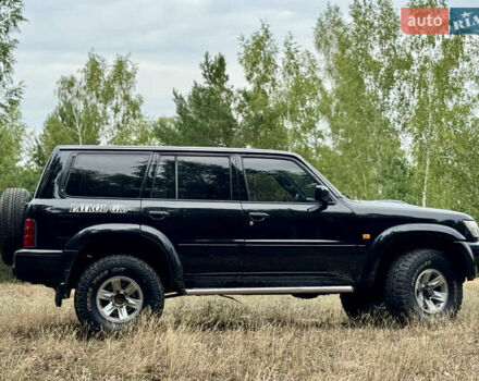Черный Ниссан Патрол, объемом двигателя 3 л и пробегом 390 тыс. км за 11750 $, фото 6 на Automoto.ua