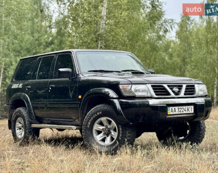 Черный Ниссан Патрол, объемом двигателя 3 л и пробегом 390 тыс. км за 11750 $, фото 9 на Automoto.ua