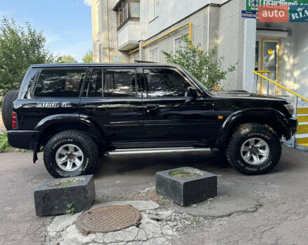 Чорний Ніссан Патрол, об'ємом двигуна 2.95 л та пробігом 400 тис. км за 13750 $, фото 9 на Automoto.ua