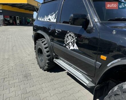 Черный Ниссан Патрол, объемом двигателя 2.95 л и пробегом 326 тыс. км за 16000 $, фото 8 на Automoto.ua