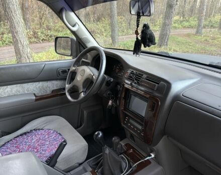 Черный Ниссан Патрол, объемом двигателя 3 л и пробегом 251 тыс. км за 9000 $, фото 13 на Automoto.ua