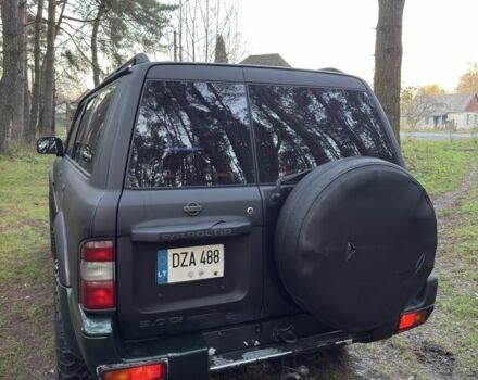 Черный Ниссан Патрол, объемом двигателя 3 л и пробегом 251 тыс. км за 9000 $, фото 4 на Automoto.ua