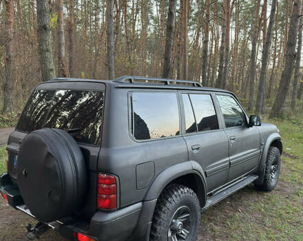 Черный Ниссан Патрол, объемом двигателя 3 л и пробегом 251 тыс. км за 9000 $, фото 7 на Automoto.ua