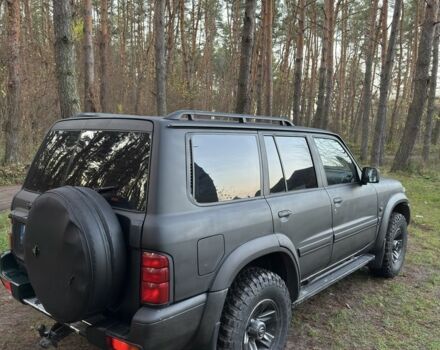 Черный Ниссан Патрол, объемом двигателя 3 л и пробегом 251 тыс. км за 9000 $, фото 6 на Automoto.ua