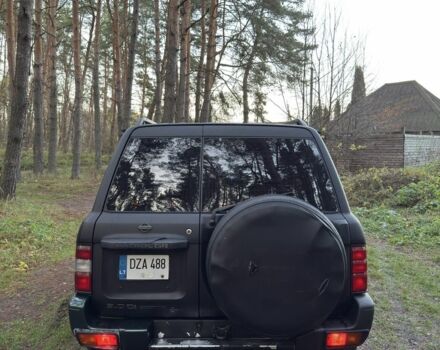 Черный Ниссан Патрол, объемом двигателя 3 л и пробегом 251 тыс. км за 9000 $, фото 5 на Automoto.ua