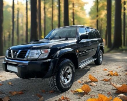 Чорний Ніссан Патрол, об'ємом двигуна 3 л та пробігом 350 тис. км за 7999 $, фото 1 на Automoto.ua