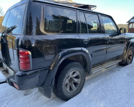 Черный Ниссан Патрол, объемом двигателя 3 л и пробегом 200 тыс. км за 8300 $, фото 3 на Automoto.ua