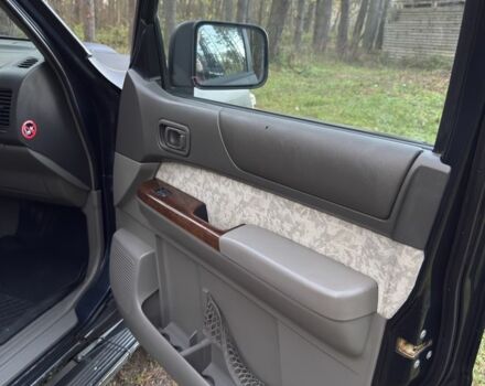 Черный Ниссан Патрол, объемом двигателя 3 л и пробегом 251 тыс. км за 9000 $, фото 11 на Automoto.ua