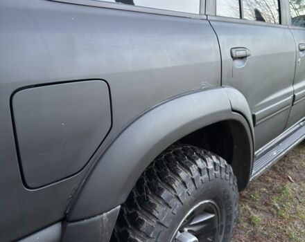 Черный Ниссан Патрол, объемом двигателя 3 л и пробегом 251 тыс. км за 9000 $, фото 7 на Automoto.ua