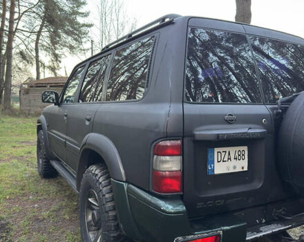 Черный Ниссан Патрол, объемом двигателя 3 л и пробегом 251 тыс. км за 9000 $, фото 6 на Automoto.ua