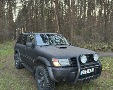 Черный Ниссан Патрол, объемом двигателя 3 л и пробегом 251 тыс. км за 9000 $, фото 12 на Automoto.ua