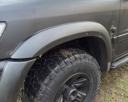 Черный Ниссан Патрол, объемом двигателя 3 л и пробегом 251 тыс. км за 9000 $, фото 2 на Automoto.ua