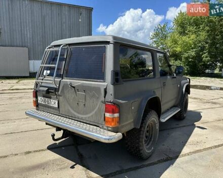 Черный Ниссан Патрол, объемом двигателя 0 л и пробегом 300 тыс. км за 10000 $, фото 5 на Automoto.ua
