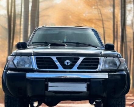 Чорний Ніссан Патрол, об'ємом двигуна 3 л та пробігом 350 тис. км за 7999 $, фото 3 на Automoto.ua