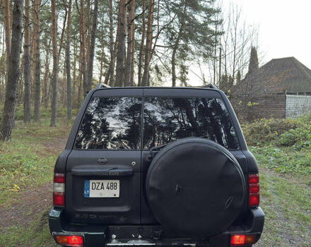 Черный Ниссан Патрол, объемом двигателя 3 л и пробегом 251 тыс. км за 9000 $, фото 4 на Automoto.ua