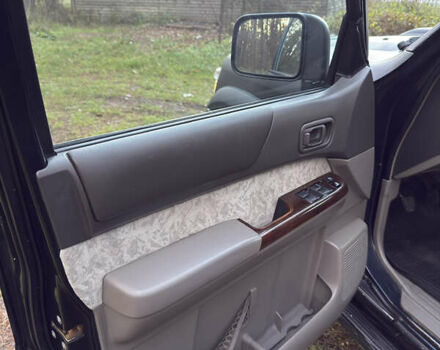 Черный Ниссан Патрол, объемом двигателя 3 л и пробегом 251 тыс. км за 9000 $, фото 19 на Automoto.ua