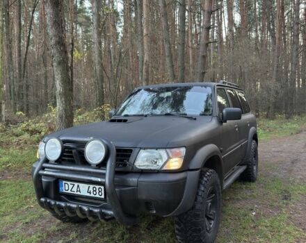 Черный Ниссан Патрол, объемом двигателя 3 л и пробегом 251 тыс. км за 9000 $, фото 1 на Automoto.ua