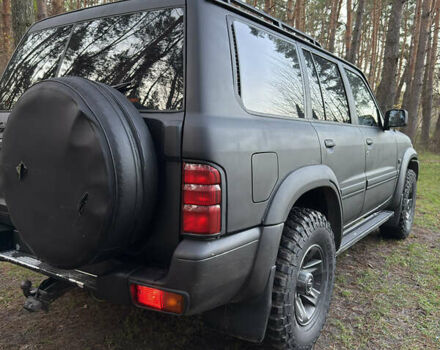 Черный Ниссан Патрол, объемом двигателя 3 л и пробегом 251 тыс. км за 9000 $, фото 5 на Automoto.ua