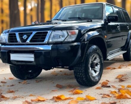 Чорний Ніссан Патрол, об'ємом двигуна 3 л та пробігом 350 тис. км за 7999 $, фото 5 на Automoto.ua
