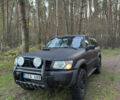 Черный Ниссан Патрол, объемом двигателя 3 л и пробегом 251 тыс. км за 9000 $, фото 1 на Automoto.ua