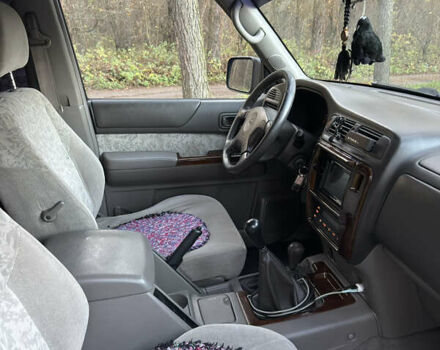 Черный Ниссан Патрол, объемом двигателя 3 л и пробегом 251 тыс. км за 9000 $, фото 13 на Automoto.ua