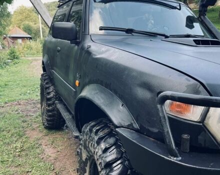 Черный Ниссан Патрол, объемом двигателя 3 л и пробегом 300 тыс. км за 6500 $, фото 1 на Automoto.ua