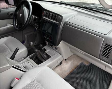 Черный Ниссан Патрол, объемом двигателя 3 л и пробегом 276 тыс. км за 22500 $, фото 5 на Automoto.ua