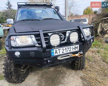 Черный Ниссан Патрол, объемом двигателя 4.8 л и пробегом 396 тыс. км за 37000 $, фото 4 на Automoto.ua