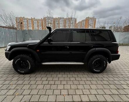 Черный Ниссан Патрол, объемом двигателя 3 л и пробегом 276 тыс. км за 22500 $, фото 4 на Automoto.ua