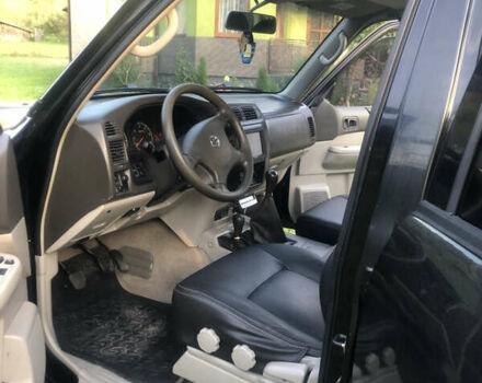 Черный Ниссан Патрол, объемом двигателя 3 л и пробегом 130 тыс. км за 19700 $, фото 4 на Automoto.ua