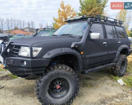 Черный Ниссан Патрол, объемом двигателя 4.8 л и пробегом 396 тыс. км за 37000 $, фото 8 на Automoto.ua