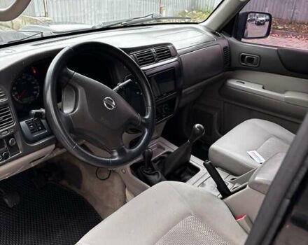 Черный Ниссан Патрол, объемом двигателя 3 л и пробегом 276 тыс. км за 22500 $, фото 3 на Automoto.ua