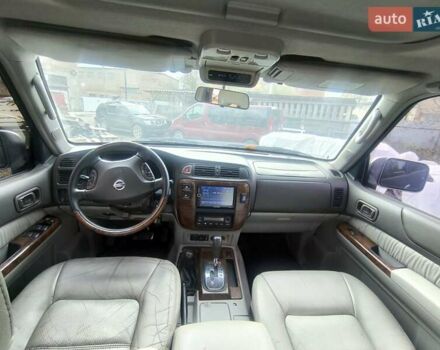 Черный Ниссан Патрол, объемом двигателя 4.8 л и пробегом 396 тыс. км за 37000 $, фото 9 на Automoto.ua