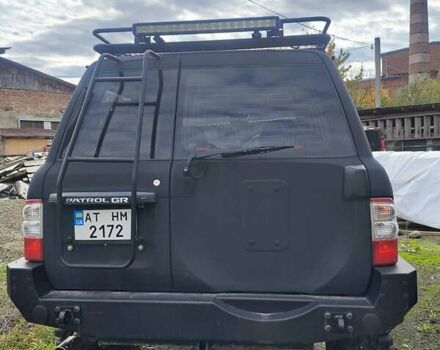 Черный Ниссан Патрол, объемом двигателя 4.8 л и пробегом 396 тыс. км за 37000 $, фото 12 на Automoto.ua