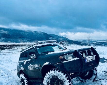 Черный Ниссан Патрол, объемом двигателя 3 л и пробегом 300 тыс. км за 6100 $, фото 1 на Automoto.ua