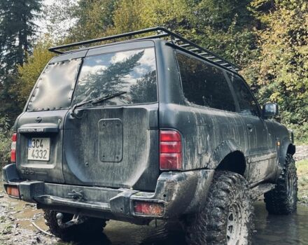 Черный Ниссан Патрол, объемом двигателя 3 л и пробегом 300 тыс. км за 6800 $, фото 7 на Automoto.ua