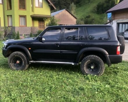 Черный Ниссан Патрол, объемом двигателя 3 л и пробегом 130 тыс. км за 17700 $, фото 2 на Automoto.ua