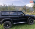 Черный Ниссан Патрол, объемом двигателя 3 л и пробегом 130 тыс. км за 19700 $, фото 2 на Automoto.ua