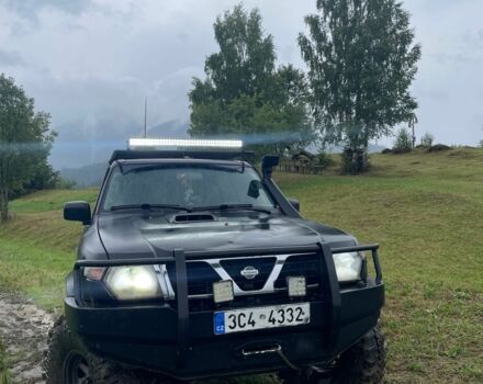 Чорний Ніссан Патрол, об'ємом двигуна 3 л та пробігом 3 тис. км за 7000 $, фото 1 на Automoto.ua