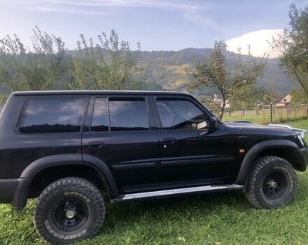 Черный Ниссан Патрол, объемом двигателя 3 л и пробегом 130 тыс. км за 17700 $, фото 1 на Automoto.ua