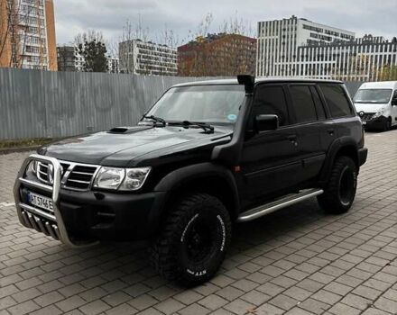 Черный Ниссан Патрол, объемом двигателя 3 л и пробегом 276 тыс. км за 22500 $, фото 7 на Automoto.ua