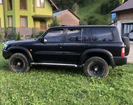 Черный Ниссан Патрол, объемом двигателя 3 л и пробегом 130 тыс. км за 19700 $, фото 1 на Automoto.ua