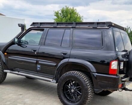 Черный Ниссан Патрол, объемом двигателя 3 л и пробегом 290 тыс. км за 3750 $, фото 2 на Automoto.ua