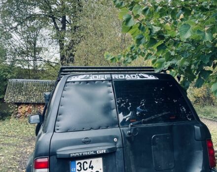 Черный Ниссан Патрол, объемом двигателя 3 л и пробегом 300 тыс. км за 6800 $, фото 4 на Automoto.ua