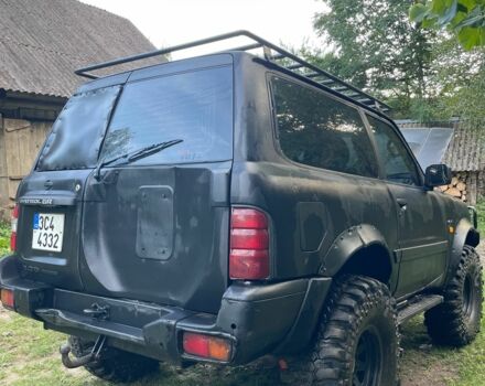 Чорний Ніссан Патрол, об'ємом двигуна 3 л та пробігом 3 тис. км за 7000 $, фото 7 на Automoto.ua