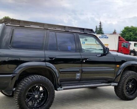 Черный Ниссан Патрол, объемом двигателя 3 л и пробегом 290 тыс. км за 3750 $, фото 6 на Automoto.ua