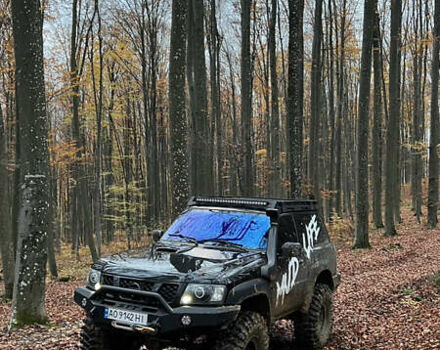 Чорний Ніссан Патрол, об'ємом двигуна 3 л та пробігом 250 тис. км за 32000 $, фото 17 на Automoto.ua