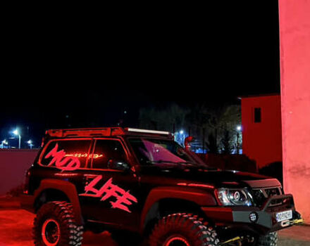 Чорний Ніссан Патрол, об'ємом двигуна 3 л та пробігом 250 тис. км за 32000 $, фото 11 на Automoto.ua