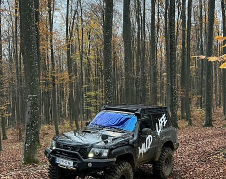 Чорний Ніссан Патрол, об'ємом двигуна 3 л та пробігом 250 тис. км за 32000 $, фото 22 на Automoto.ua